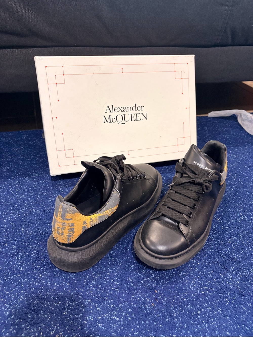 Alexander McQUEEN Black Leather Low-Top Sneakers with Yellow Heel Print